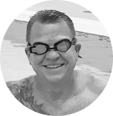 Fitness swimmer Christopher Rocke wearing swim goggles