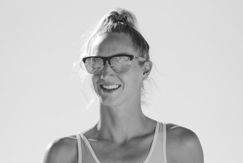 Emma Pallant-Browne wearing sunglasses and swim suit
