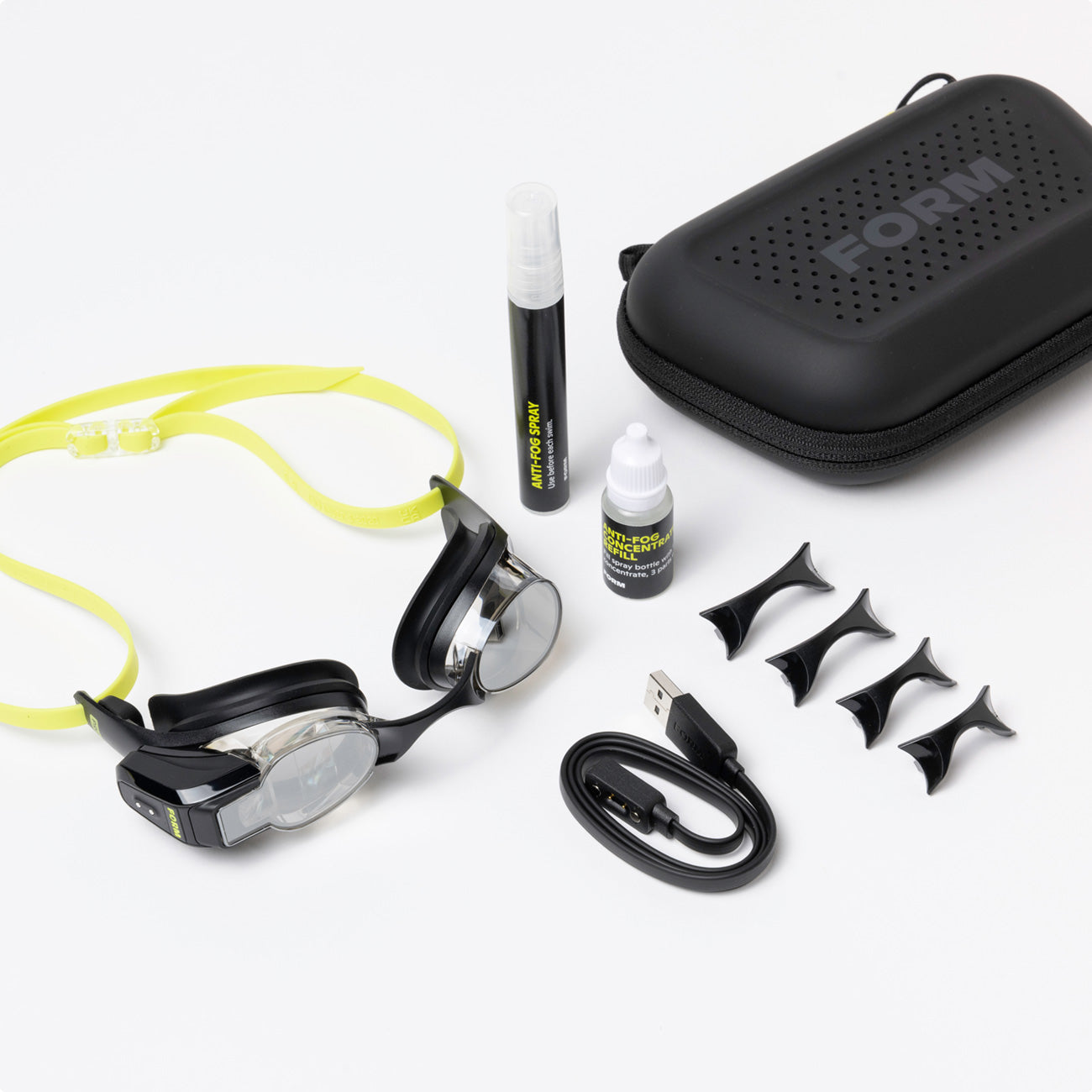 FORM Smart Swim 2 PRO in the box contents including anti-fog spray