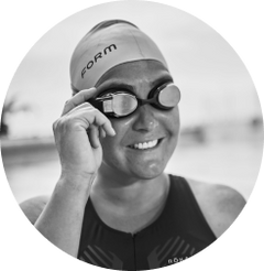 Woman smiling and wearing FORM Goggles