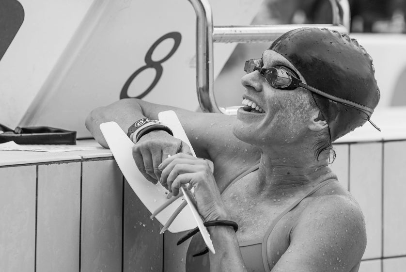 Skye Moench female triathlete at the edge of the swimming pool