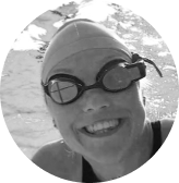 Swim coach Rebekka Ott smiling with FORM swim goggles